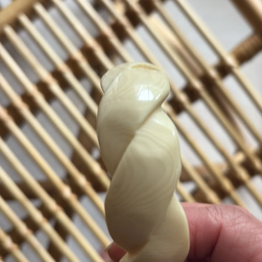 Cream Twisted Bangle Bracelet vintage. Bone or resin or shell. Nice creamy color